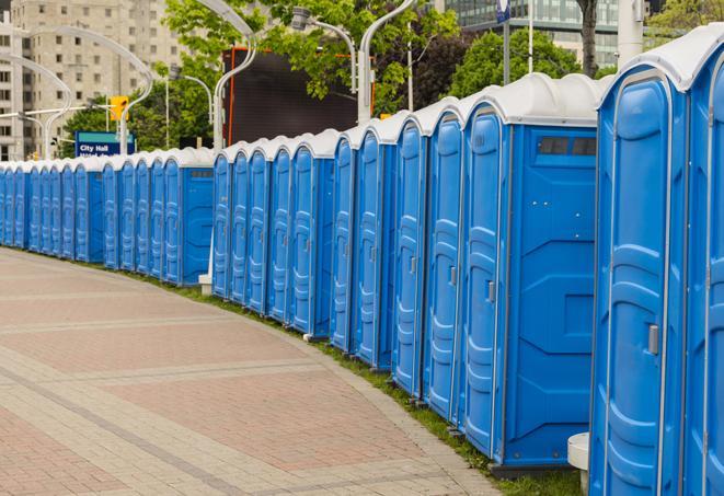 a row of portable restrooms at a fairground, offering visitors a clean and hassle-free experience in Grand Prairie